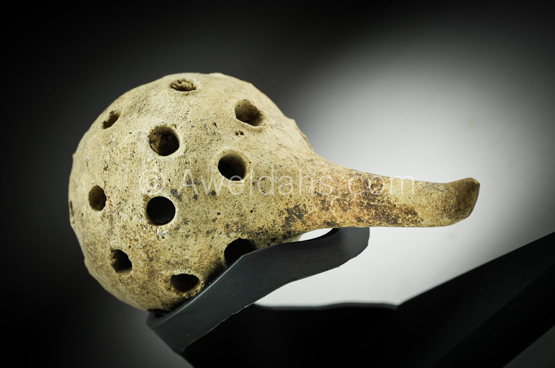 Ancient terra-cotta baby rattle, 2000 BC