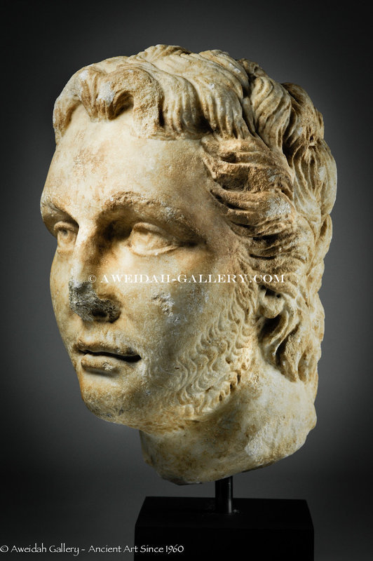 Roman marble portrait head of a youth, 2nd-3rd AD