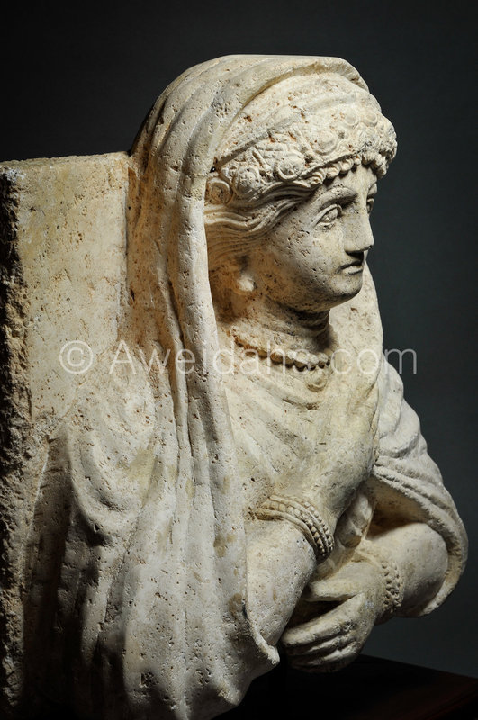 Roman limestone bust of a veiled female, 1st A.D