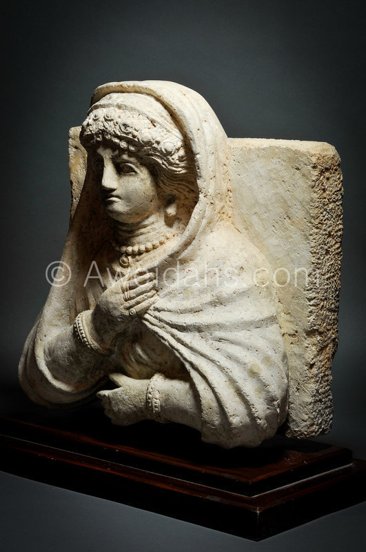 Roman limestone bust of a veiled female, 1st A.D