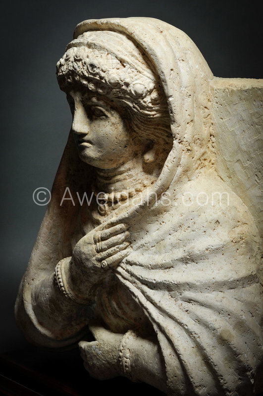 Roman limestone bust of a veiled female, 1st A.D
