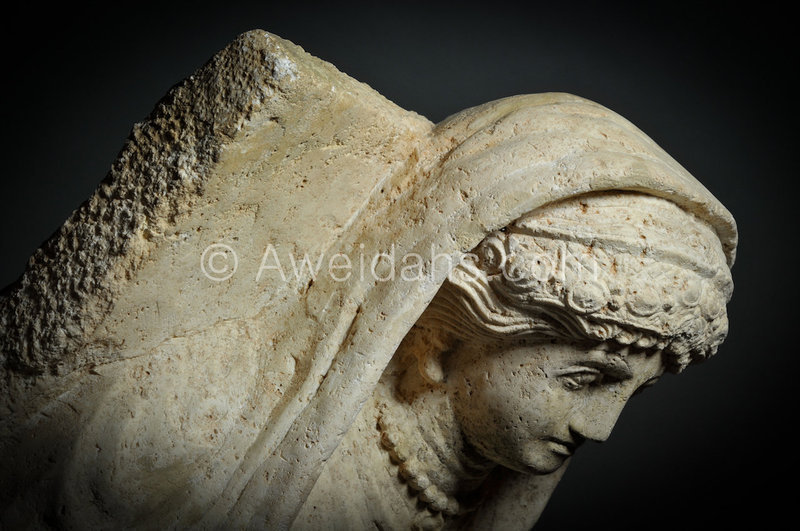 Roman limestone bust of a veiled female, 1st A.D