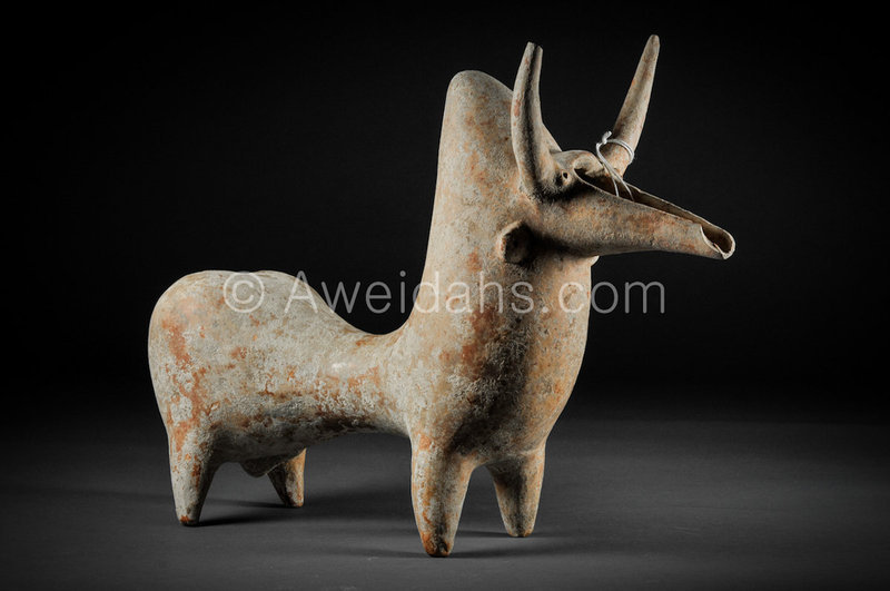 An Amlash terracotta hump-backed bull rython