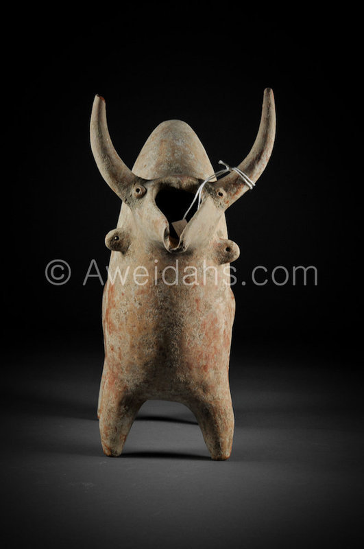 An Amlash terracotta hump-backed bull rython