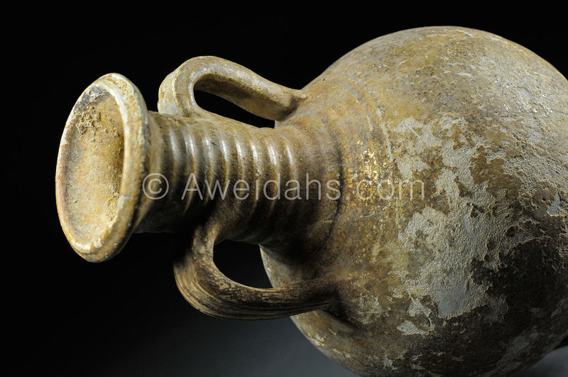 Parthian glazed pottery wine rython flask, 2nd AD