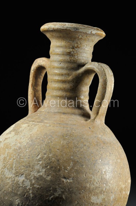 Parthian glazed pottery wine rython flask, 2nd AD