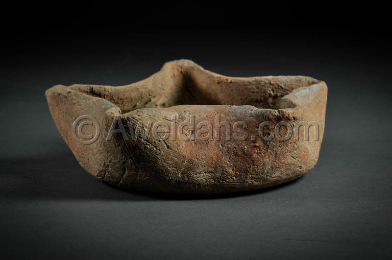 Biblical Iron Age oil lamp with five wick spouts, 1000 BC