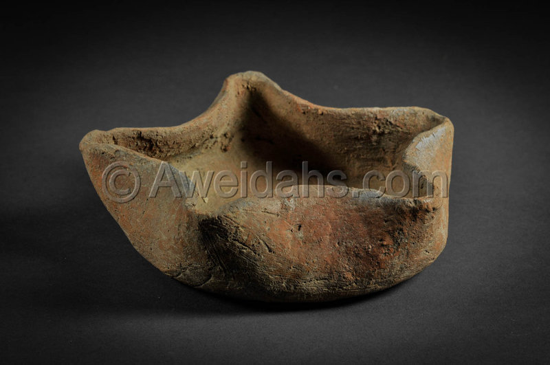 Biblical Iron Age oil lamp with five wick spouts, 1000 BC