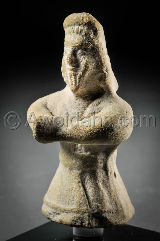 Mesopotamian pottery figure of a standing worshiper, 1800 B.C