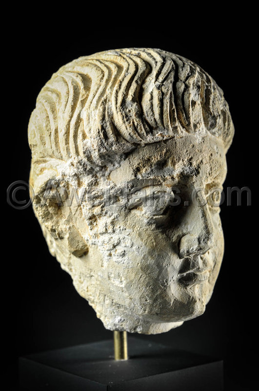 Limestone head of a youth, Roman Palmyra, 1st Century A.D