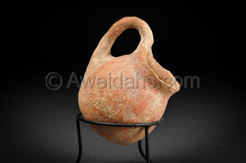 Chalcholithic Age pottery jar with a looped handle, 3500 BC