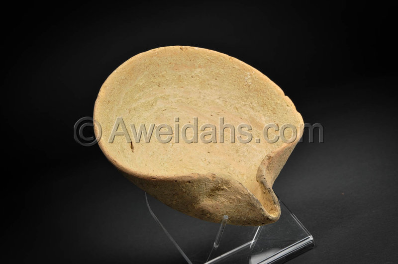 Biblical Iron Age pottery saucer oil lamp, 1000 BC