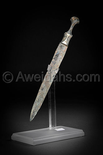 Ancient Persian bronze dagger with a decorated handle, 1000 B.C
