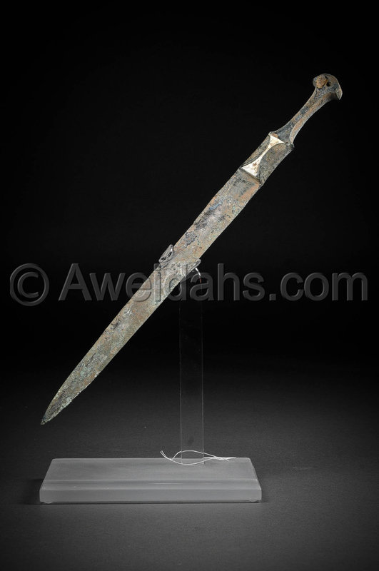 Ancient Persian bronze dagger with a decorated handle, 1000 B.C