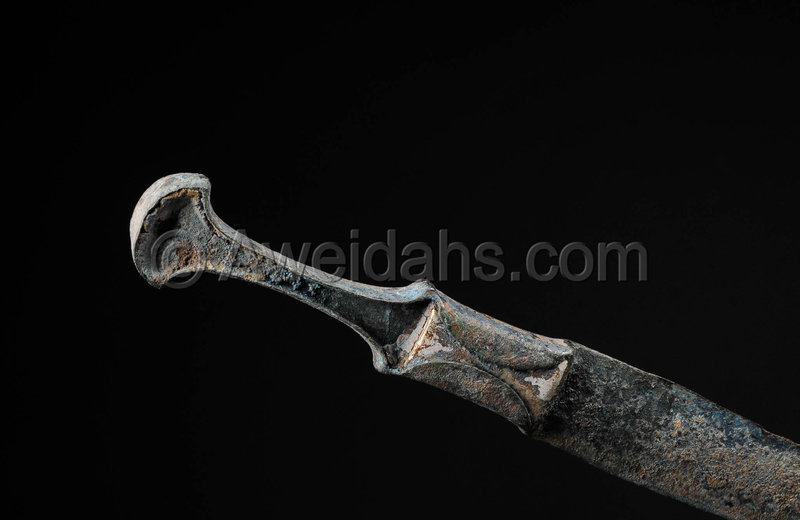 Ancient Persian bronze dagger with a decorated handle, 1000 B.C