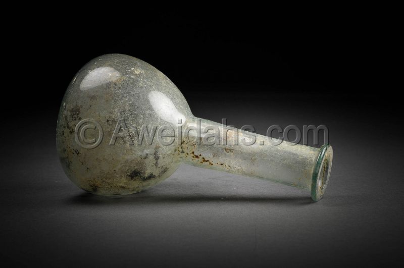 Ancient Roman glass flask, 100 - 300 AD