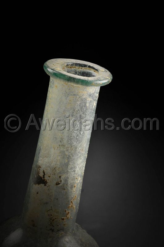 Ancient Roman glass flask, 100 - 300 AD