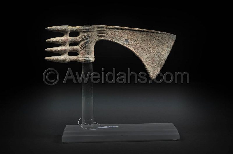 Persian decorated bronze spike-butted axe-head 1000 BC