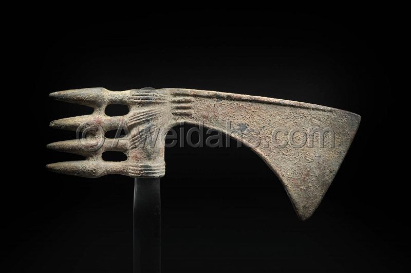 Persian decorated bronze spike-butted axe-head 1000 BC