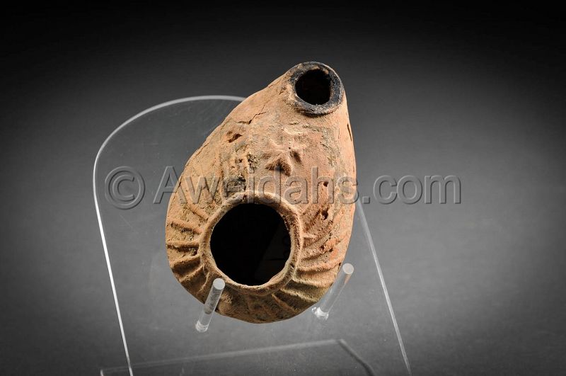 Byzantine pottery oil lamp with a cross, 400 AD