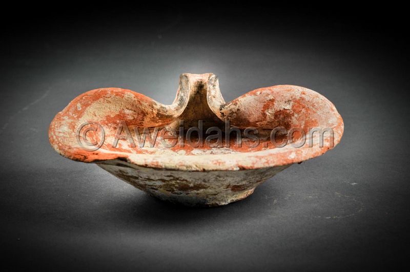 Ancient pottery oil lamp, 900 – 586 BC