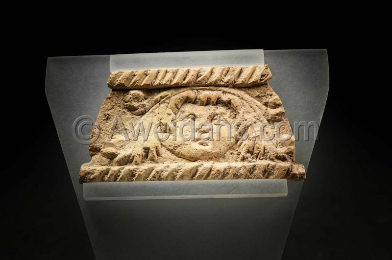 Ancient Roman bone fragment depicting cupid, 1st Cent AD
