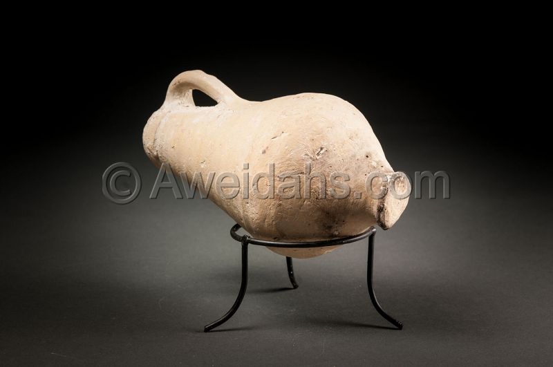 ANCIENT TERRACOTTA WINE MEASURING JUGLET, 330 BC