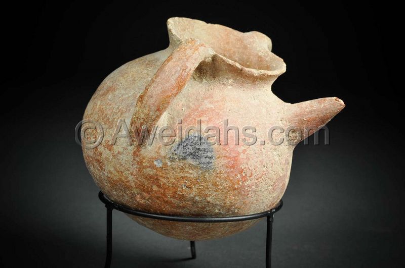 Canaanite Early Bronze age burnished pottery spouted jar, 3000 BC