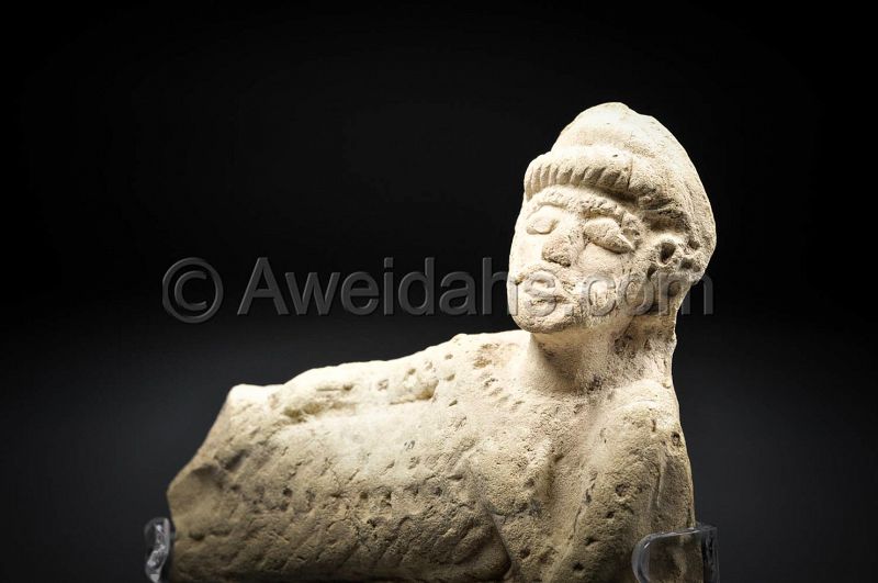 Ancient Parthian clay figure of a reclining man, 100 AD