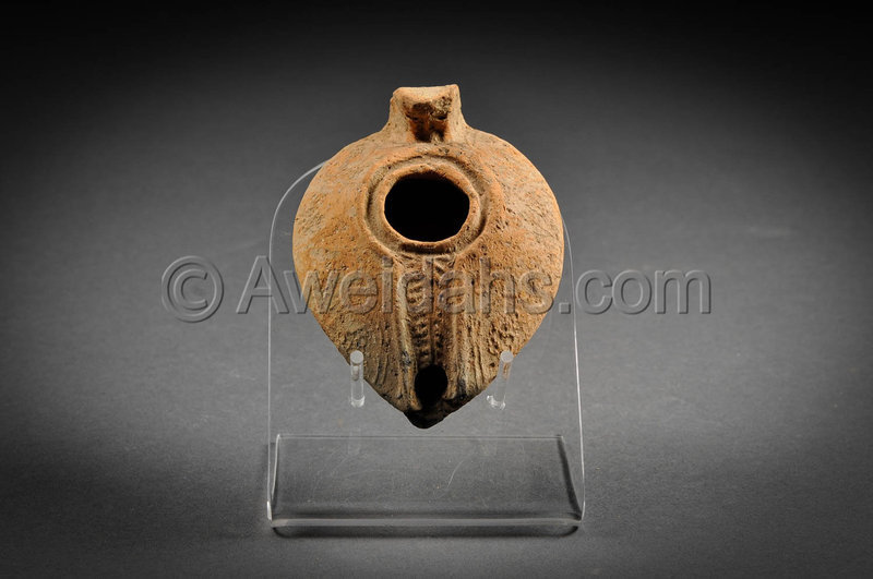 Ancient Islamic highly decorated pottery oil lamp, 8th Cent. AD