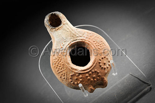 Roman decorated pottery oil lamp, 200 - 300 AD