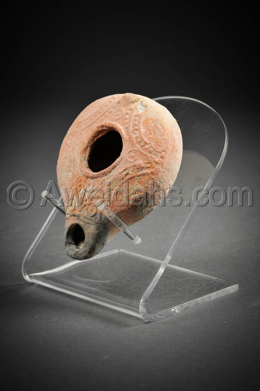 Roman terracotta oil lamp, 100 - 300 A.D.