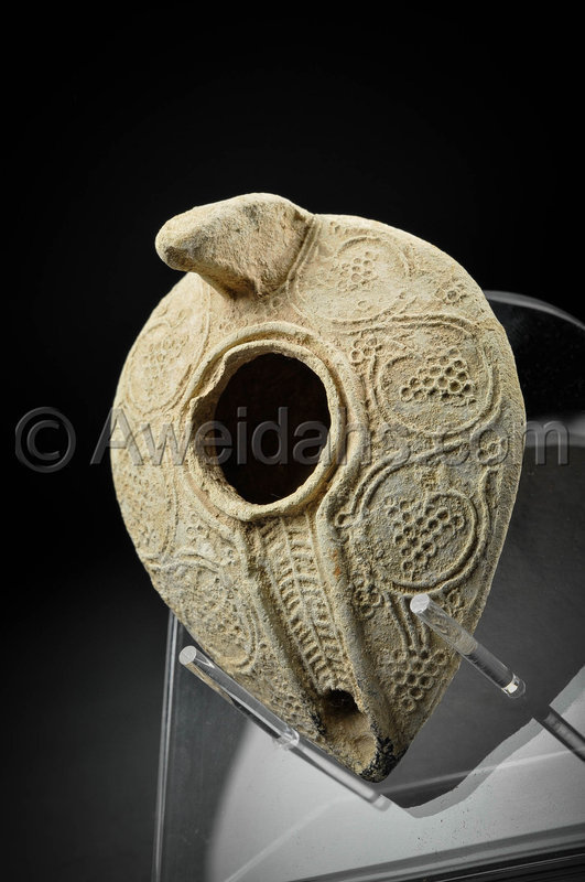 Ancient Islamic highly decorated pottery oil lamp, 8th Cent. AD