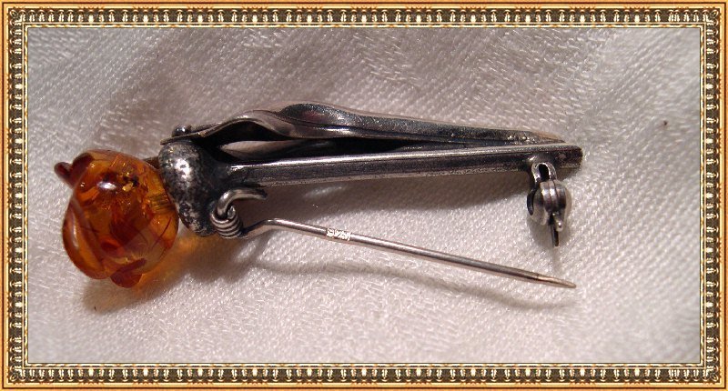 Vintage Mod or Arts Crafts Sterling Carved Amber Pin