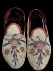 A Pair of  Beaded Santee Sioux Hide Moccasins