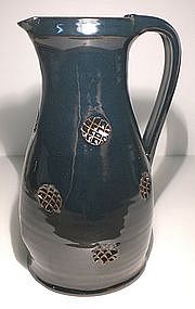 Temmoku Glazed Jug With Impressed Waffle Decoration