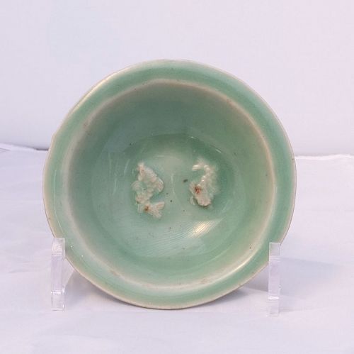 A Chinese celadon twin fish dish; Yuan dynasty