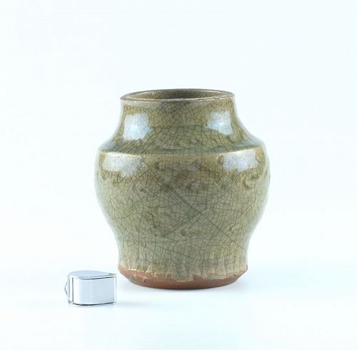 A Chinese Longquan kiln celadon jar; Ming dynasty