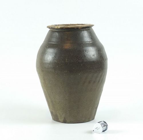 A Chinese Cizhou-type teadust glazed jar; Song dynasty