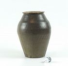 A Chinese Cizhou-type teadust glazed jar; Song-Yuan dynasty