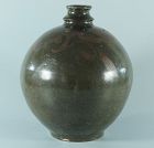 A Chinese ovoid wine bottle; Jin dynasty