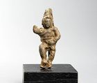 Roman lead Attis or Paris votive statuette