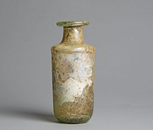 Roman glass cylinder bottle with iridescence