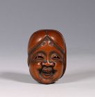 A Japanese Boxwood Mask Netsuke 19thC