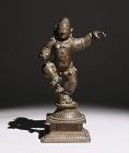 A Bronze Figure of the Dancing Krishna S India