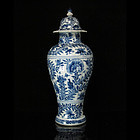 KANGXI BLUE AND WHITE FLORAL COVERED BALUSTER VASE