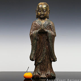 16TH C MING LACQUERED IRON STANDING FIGURE OF ANANDA