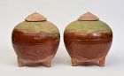 A Pair of Chinese Amber and Green Glazed Pottery Globular Jars
