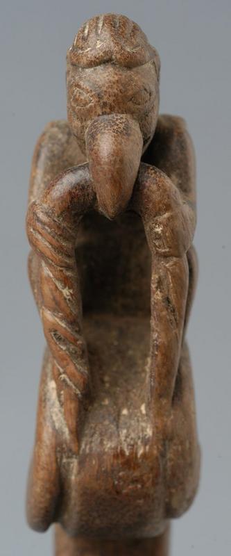 A Burmese Carved Wooden Sickle Handle with Parrot