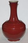 A Flambe glazed bottle vase.